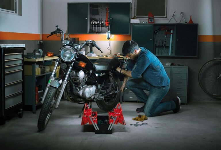 a-mechanic-fixes-a-motorcycle-in-his-garage-2022-11-16-00-20-24-utc (1)